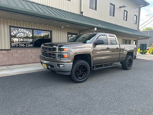 Customer vehicle in front of Tri-County Transmissions shop