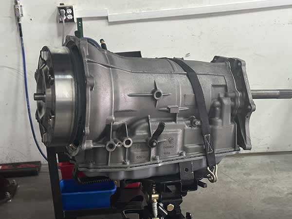 Detailed close-up of transmission internals being inspected